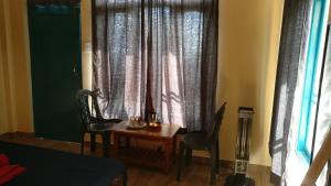 Area soggiorno di White Rabbit Guest House