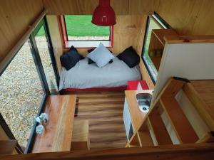 Posezení v ubytování Quyé Tiny House