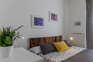 Posteľ alebo postele v izbe v ubytovaní Albergo Diffuso Monopoli