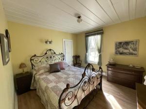 Cama o camas de una habitación en La Maison des Leclerc