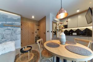 Kuchyň nebo kuchyňský kout v ubytování Tatra Square Apartments