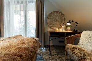 Postel nebo postele na pokoji v ubytování Tatra Square Apartments