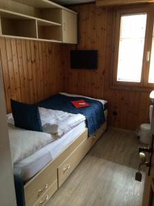 Postel nebo postele na pokoji v ubytování Mazot Zermatt
