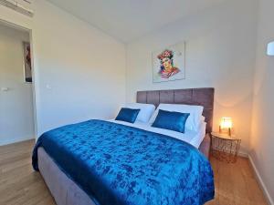 Postel nebo postele na pokoji v ubytování Apartment StellaMare