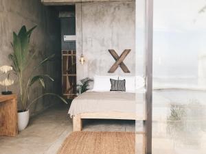 Postel nebo postele na pokoji v ubytování Morena Boutique Hotel Weligama