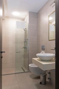 Koupelna v ubytování Paliani Hotel