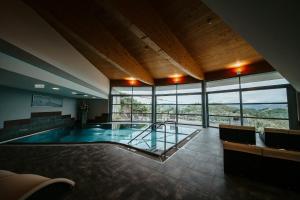 Piscina a Weinrefugium Brolli o a prop
