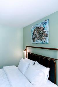 Letto o letti in una camera di Paliani Hotel