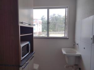 Ένα μπάνιο στο Apartamento na Praia dos Milionários em Ilhéus - Vog Atlântico +6 φωτογραφίες