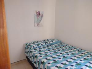 Ένα ή περισσότερα κρεβάτια σε δωμάτιο στο Apartamento na Praia dos Milionários em Ilhéus - Vog Atlântico