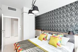 Postel nebo postele na pokoji v ubytování Dreams apartments Dune B