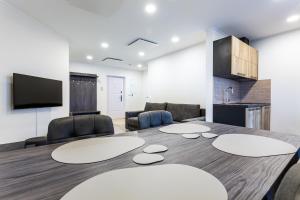 a conference room with a table and chairs at Apartmány Na Výhledech in Loučná pod Klínovcem