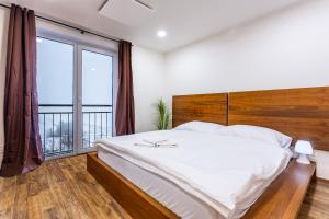 Postel nebo postele na pokoji v ubytování Apartmány Na Výhledech