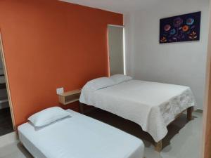 Postelja oz. postelje v sobi nastanitve Naranja Departamento 33 M2 nuevo