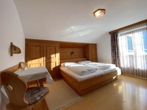 Postel nebo postele na pokoji v ubytování Landhaus Rohrmoser