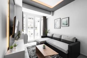 Area tempat duduk di Adelle Apartments, The Luxury Suites