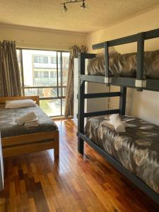 A bunk bed or bunk beds in a room at Jindabyne Apartments