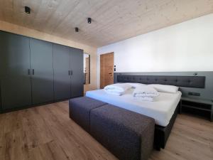 A bed or beds in a room at Haus Wally