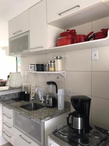 Η κουζίνα ή μικρή κουζίνα στο Apartamento no Condomínio Villa das Águas