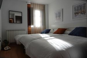 Katil atau katil-katil dalam bilik di ❅ Pirineos360 ❅ Stone · Garaje cubierto y Trastero