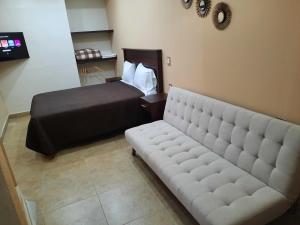 TV a/nebo společenská místnost v ubytování Suites Del Risco