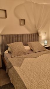 Letto o letti in una camera di Les hauts du fromager
