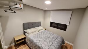 Postel nebo postele na pokoji v ubytování NEO CASA