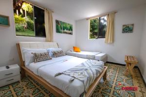 MINCA Chunuu - glamping - coworking MINCA客房内的一张或多张床位