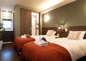 Miidokoro House Hotel客房内的一张或多张床位