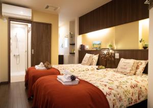 Miidokoro House Hotel客房内的一张或多张床位