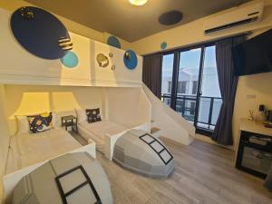 Ένα ή περισσότερα κρεβάτια σε δωμάτιο στο Sunlight Forest Homestay