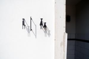 a group of people on the side of a wall at Velawarin Hotel in Ubon Ratchathani