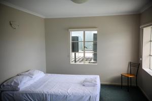 Postel nebo postele na pokoji v ubytování Beltana Hotel