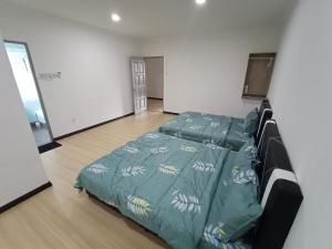 Photo de la galerie de l'établissement Sunny Homestay Kuching - LANDED 14 PAX, à Kuching