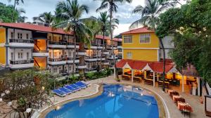 an aerial view of a resort with a swimming pool at Santiago Beach Resort in Baga