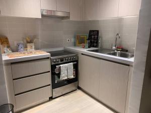 A kitchen or kitchenette at Entire Cozy Water-front Studio with Kitchen