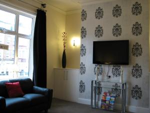 TV a/nebo společenská místnost v ubytování Howdale