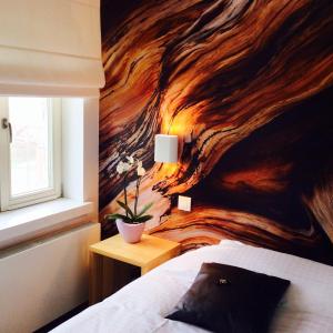 Postel nebo postele na pokoji v ubytování B&B Lisdodde