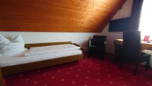 Postel nebo postele na pokoji v ubytování Hotel Landgasthof Fromm