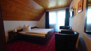 Postel nebo postele na pokoji v ubytování Hotel Landgasthof Fromm