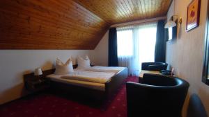 Postel nebo postele na pokoji v ubytování Hotel Landgasthof Fromm