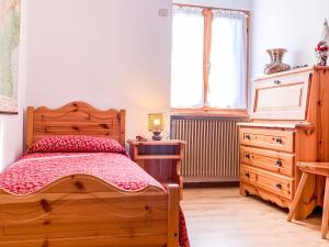 Ένα ή περισσότερα κρεβάτια σε δωμάτιο στο APPARTAMENTO CASANOVA +22 φωτογραφίες