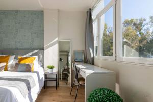 Postel nebo postele na pokoji v ubytování Apartamento en la Playa en Paseo Maritimo