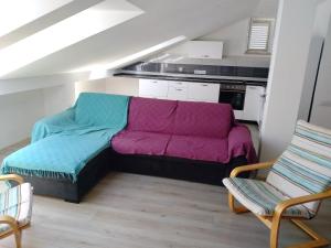 a living room with a couch and two chairs at Apartments Bezek in Trstenik +35 photos