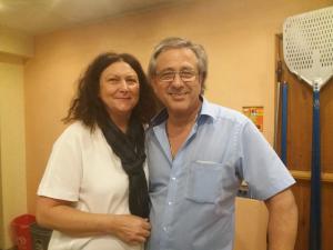 a man and a woman posing for a picture at La Locanda Ristorante Pizzeria Garni in Ohlstadt