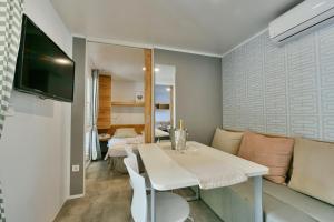 Een TV en/of entertainmentcenter bij Polidor Camping Resort
