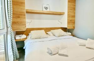Een bed of bedden in een kamer bij Polidor Camping Resort