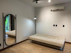 Cama ou camas em um quarto em Verona Parque Hotel