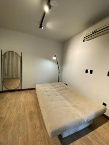 Cama ou camas em um quarto em Verona Parque Hotel