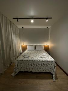 Cama ou camas em um quarto em Verona Parque Hotel